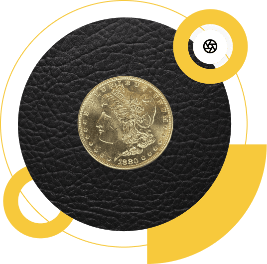 A vintage 1880 coin with intricate engravings rests on textured black leather, accented by yellow geometric designs. Modern and antique elements blend, evoking timeless craftsmanship.