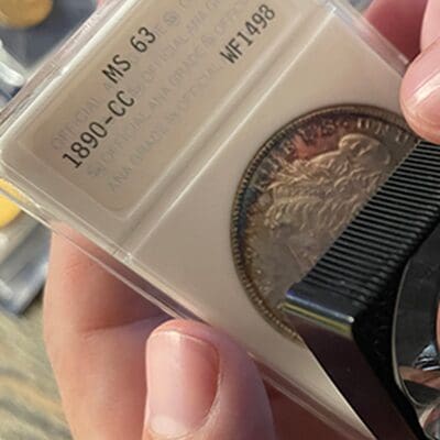 Detailed close-up of an assorted pile of pennies, highlighting the diversity in wear and patina of each coin.