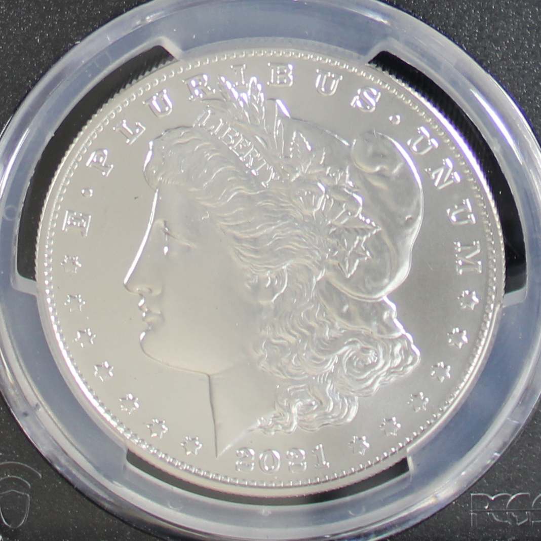 A collection of Morgan Silver Dollars, highlighting the coin's return with its historic design and modern minting techniques.