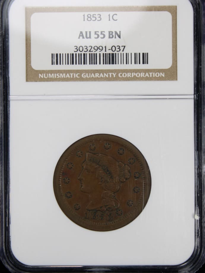 Ultimate Guide To Valuable Large Cent Pennies 2 Front view of a valuable 1853 Coronet Head Cent, securely encased in a guarantee package, showcasing its historical and numismatic significance.