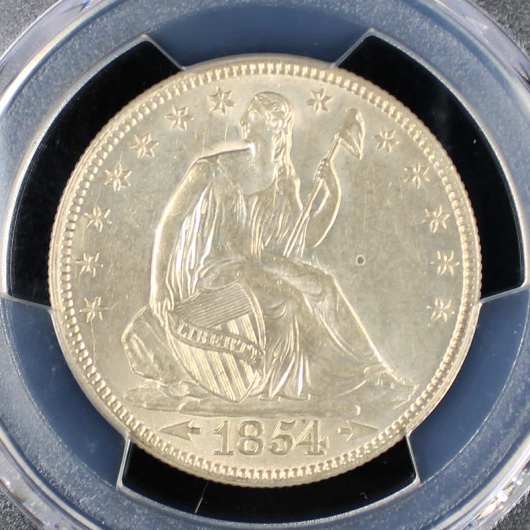 Detailed close-up of an assorted pile of pennies, highlighting the diversity in wear and patina of each coin.