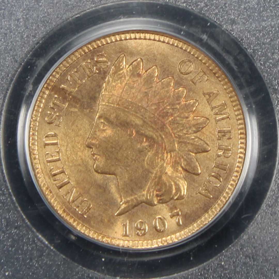 Detailed close-up of an assorted pile of pennies, highlighting the diversity in wear and patina of each coin.